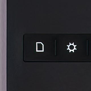 Detail photo of Push’s learn button.